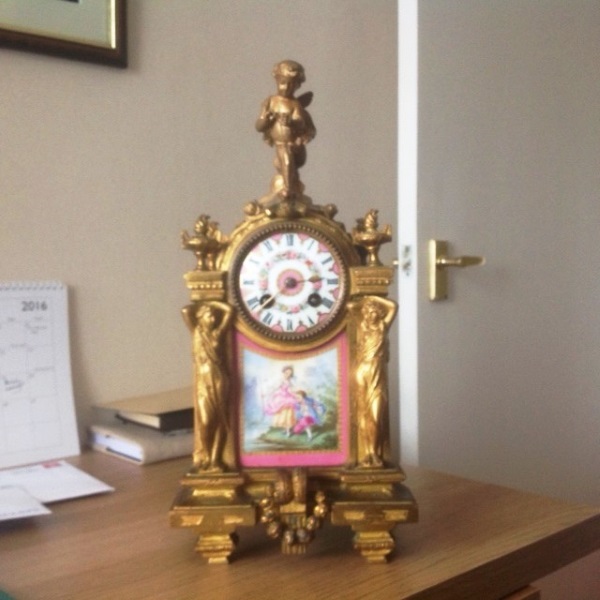 French ormolu clock prior to restoration French ormolu clock prior to restoration